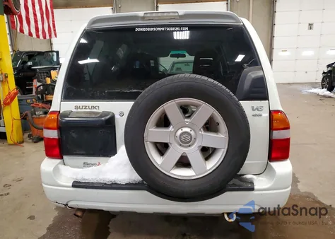 2002 Suzuki Xl7 Plus z USA, uszkodzony, nr VIN JS3TX92V824100804